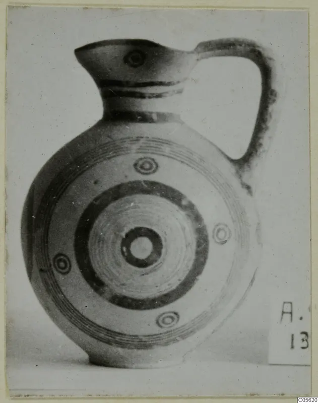 Black-on-Red juglet from Amathus with concentric circle decoration, seen from the side