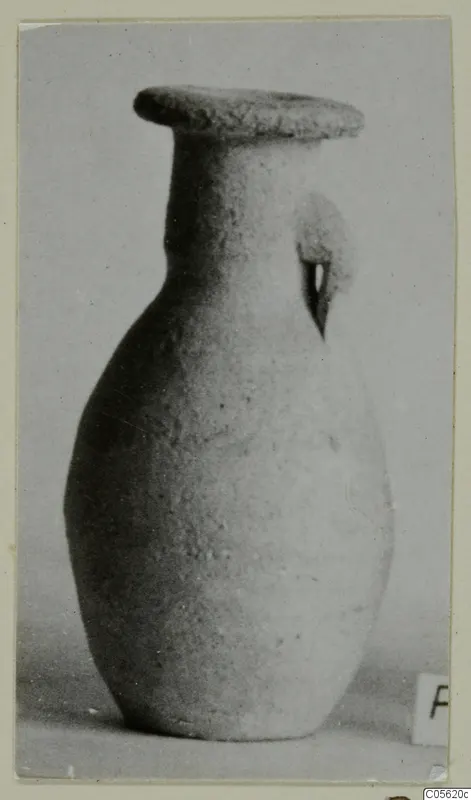 Pottery Plain White IV-V juglet with a flat rim and one loop handle, from Amathus tombs