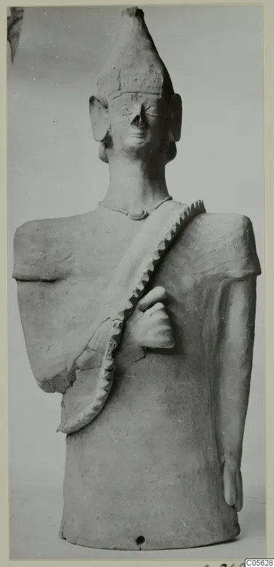 Terracotta Proto-Cypriote II, a standing figure with a tall conical headdress and a notched band across the chest