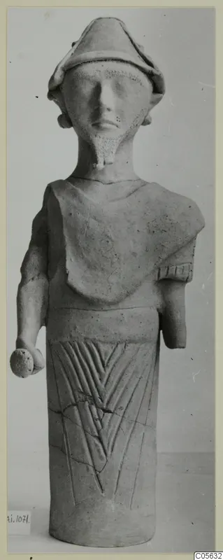 Terracotta figure with a helmet-like cap and a ball-like object in its left hand, Proto-Cypriote I, Ayia Irini