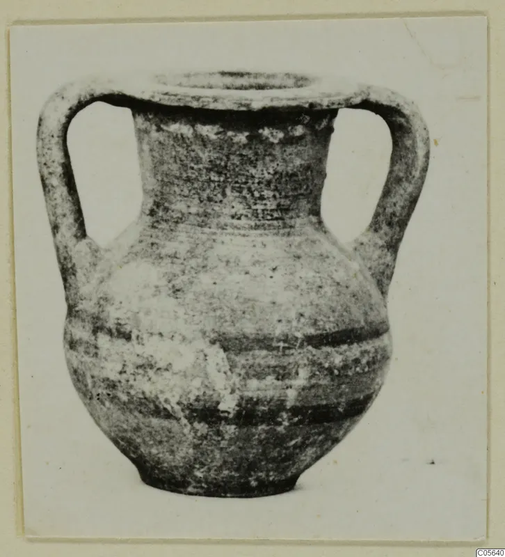 Two-handled pottery vessel with dark horizontal bands, from Marion