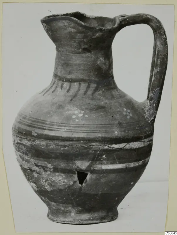 Jug with a pinched mouth, single strap handle and dark painted bands, from Marion tombs 1–30