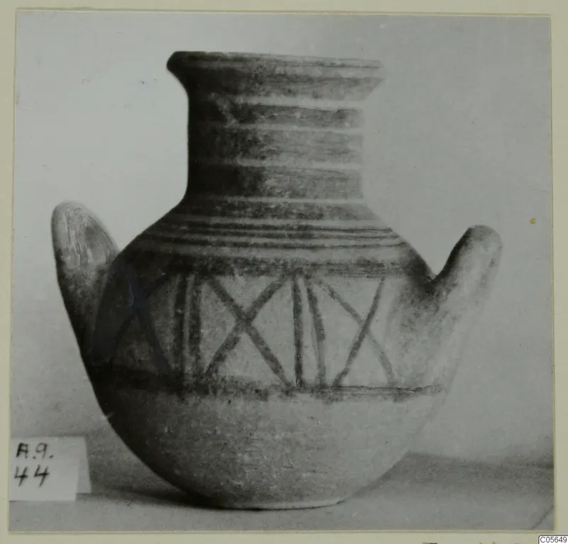 Two-handled pottery amphora-crater from Amathus with painted bands and a criss-cross pattern on the body.