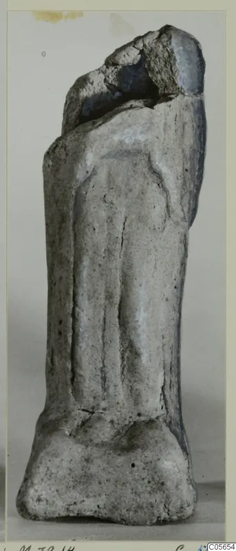 Terracotta minor plastic object from Marion, a broken upright figurine fragment on a flat base