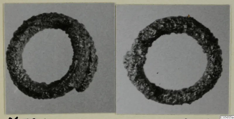 Two photographs of a corroded silver ring from the Marion finds from tombs 31–45