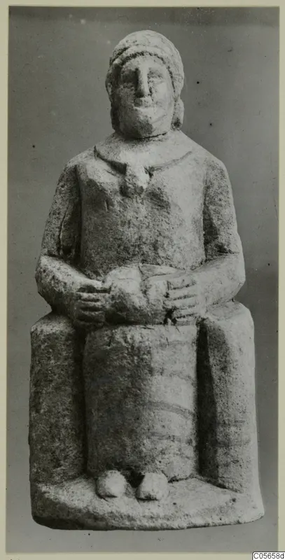 Seated limestone statuette of a figure with hands clasped in its lap, from Marion tombs 46–60