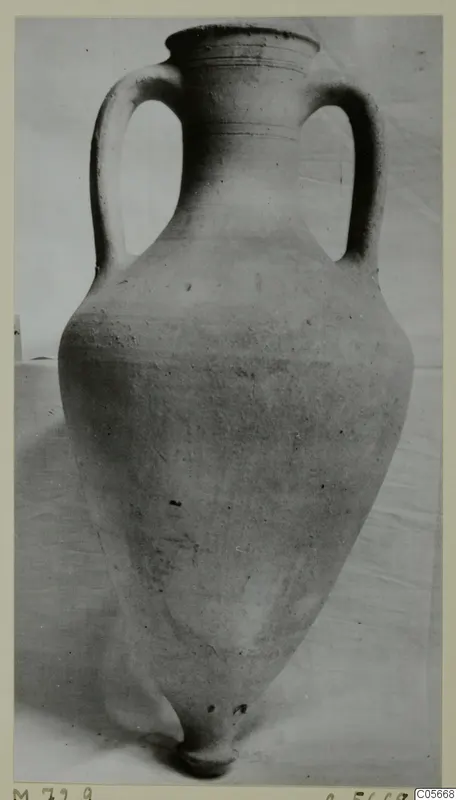 Pottery Plain White VII amphora with two handles and a narrow base, photographed against a plain backdrop.