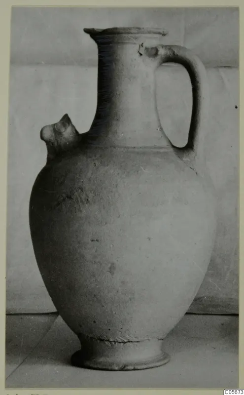 Pottery Plain White VII jug with a loop handle and side spout, from the tombs 46–60 finds at Marion