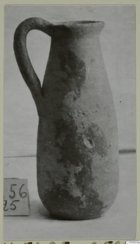 Pottery Plain White VI jug from Marion, with a single loop handle, photographed on a plain background