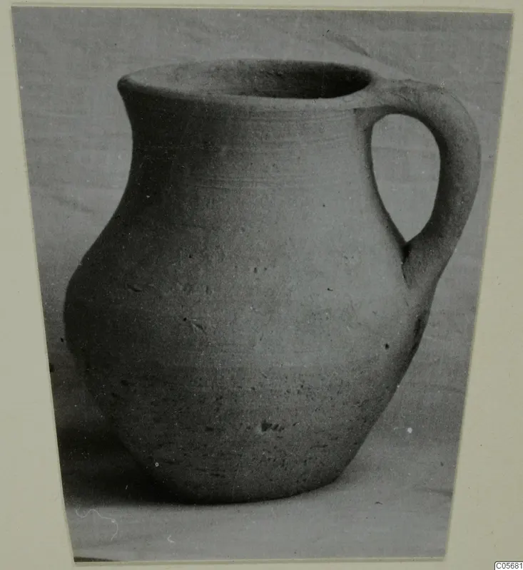 Pottery Coarse Ware jug (M.57) with a single loop handle, from the Marion tombs 46–60 series