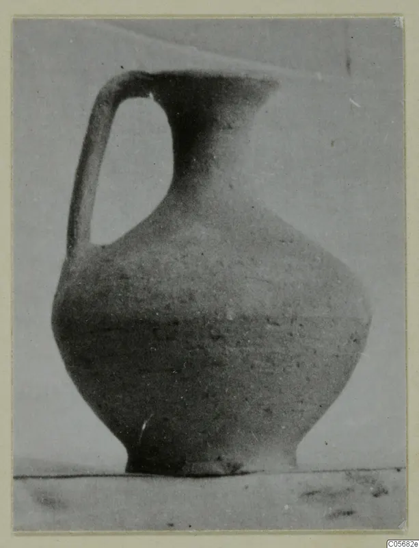 Pottery Plain White VI jug with a single handle and a flared rim