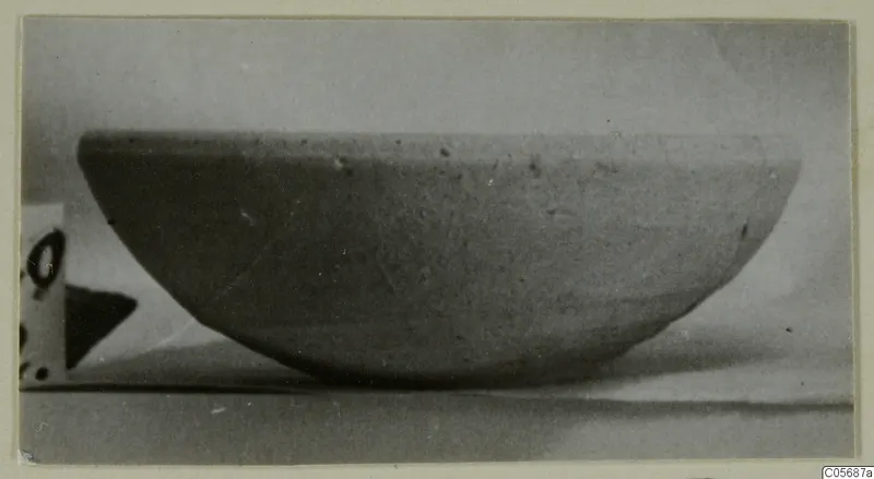 Pottery Plain White VI bowl, shallow and wide, photographed from the side against a pale background