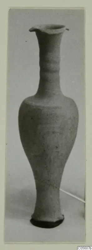 Tall pottery vessel with a flared rim, long neck and tapering base, from the Marion tomb finds