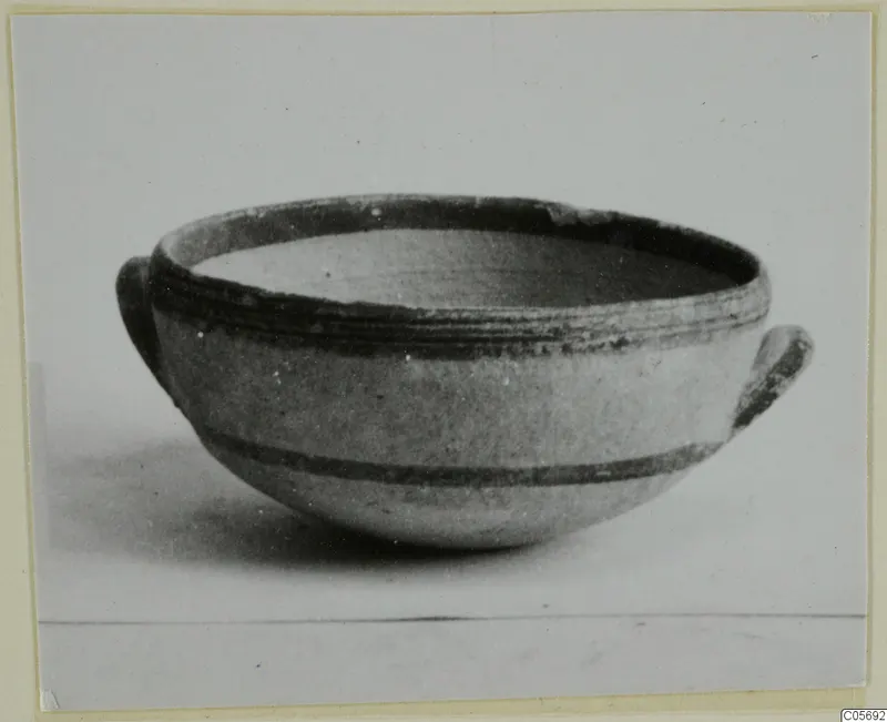 Pottery White Painted II bowl from Amathus with two small loop handles and dark painted bands