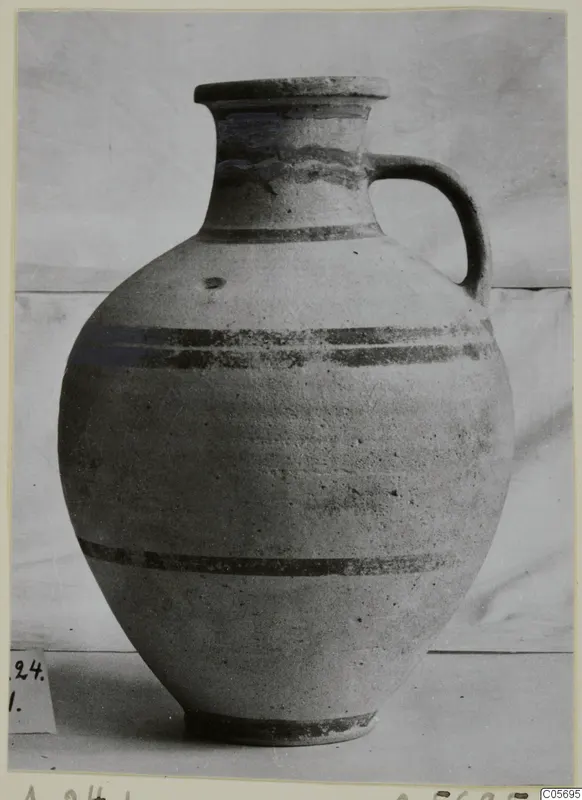 Pottery jug with a single handle and dark painted bands, from Amathus, finds from tombs 10–26