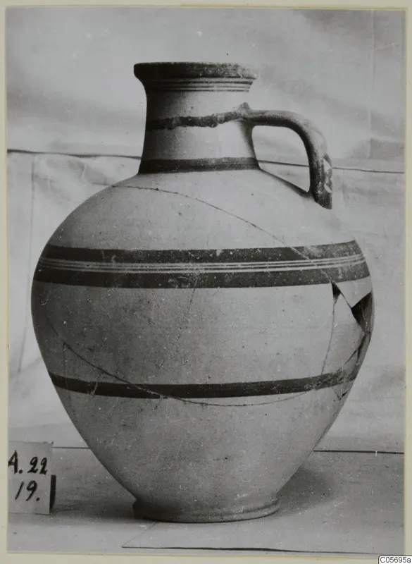 Pottery jug with a single strap handle and dark painted bands, from the Amathus tomb finds