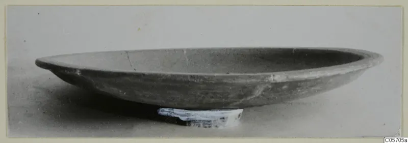 Red Slip plate, a shallow open dish seen from the side against a pale background