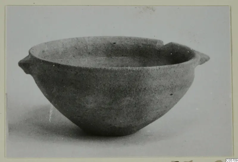 Plain pottery bowl with two small handles, from the Amathus tombs 1–9 finds