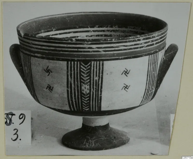 Pottery Bichrome III footed bowl with two side handles, painted bands, vertical stripes and hooked cross motifs