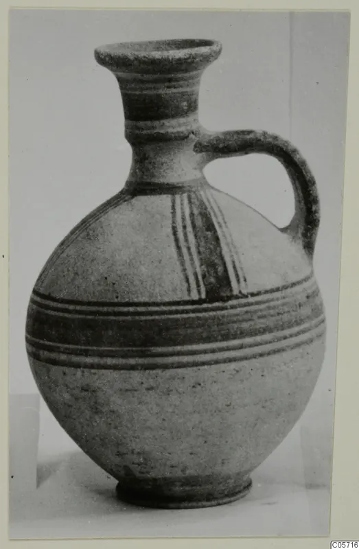 Pottery Bichrome II jug from Amathus with a single handle and painted bands
