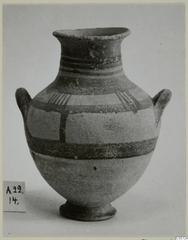 Amphoriskos, White Painted I pottery, with dark painted bands and two handles, photographed against a plain background
