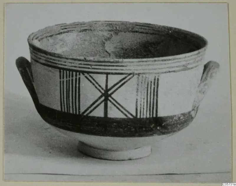 Pottery Bichrome III bowl with two handles, painted bands and panels of vertical lines and crossed lines