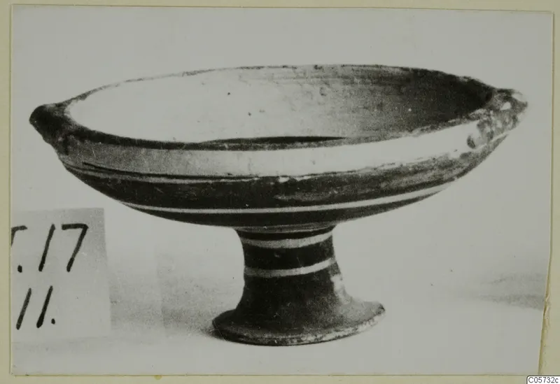 Pottery Bichrome IV plate-jug, a shallow footed bowl with pale bands, shown in profile
