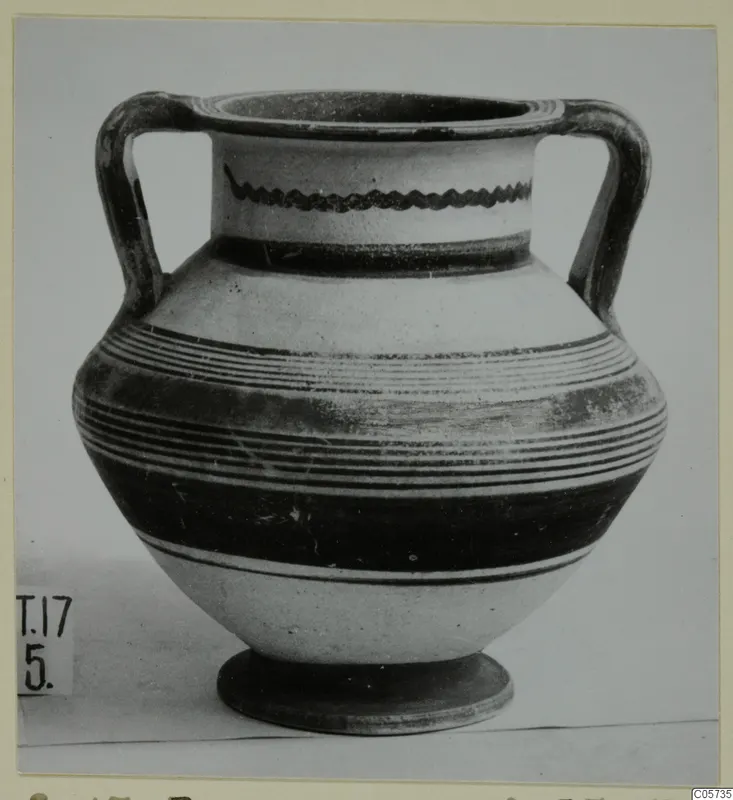 Pottery Bichrome IV amphora-crater, a two-handled vessel with dark painted bands and a wavy line on the neck.