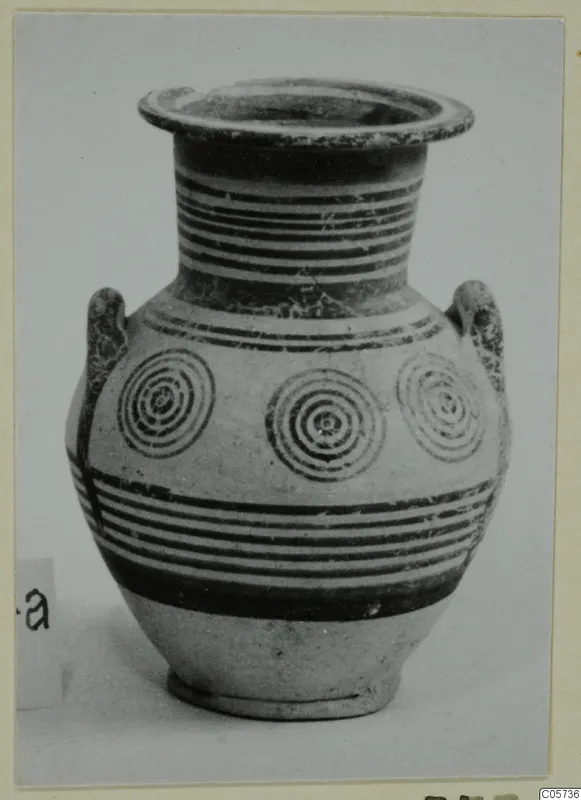 Pottery Bichrome IV amphora-crater: two-handled vessel with banded neck and concentric circles on the body
