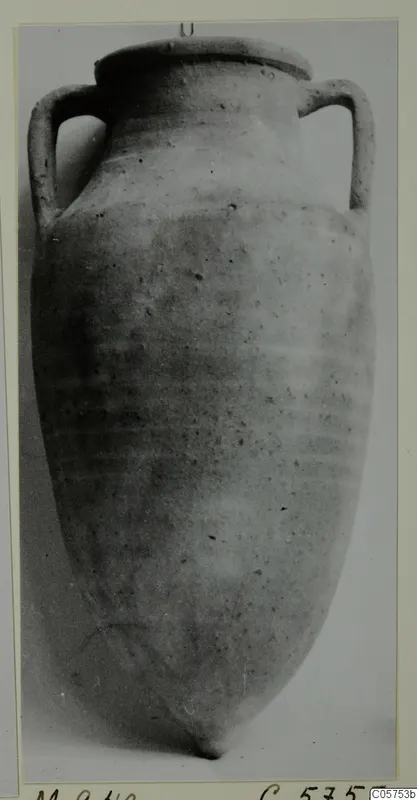 Two-handled pottery jar with a flat rim and tapering body, photographed upright against a grey backdrop