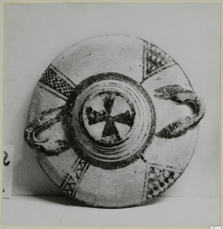 White Painted I bowl from Amathus, seen from above, with two loop handles and dark painted radiating bands.