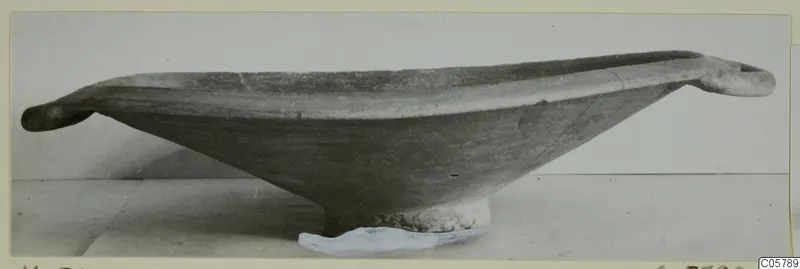 Pottery Red Slip I_III - V_VII bowl with a handle at each end, seen from the side