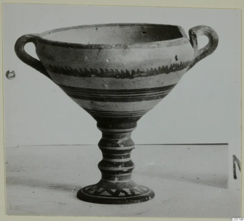 Pottery White Painted I bowl from Marion: a footed two-handled bowl with dark painted bands and zigzag decoration