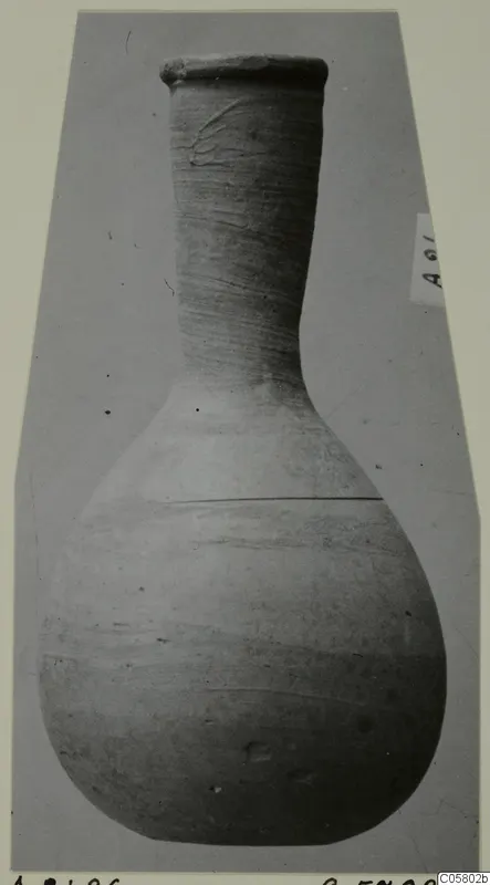 Unguentarium from Amathus tombs 10–26, a flask with a tall narrow neck and rounded body