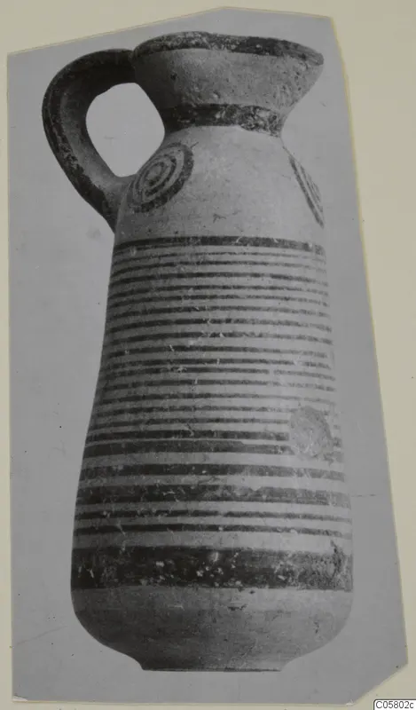 Pottery White Painted IV juglet from Amathus, with a strap handle, concentric circles on the shoulder and horizontal bands on the body