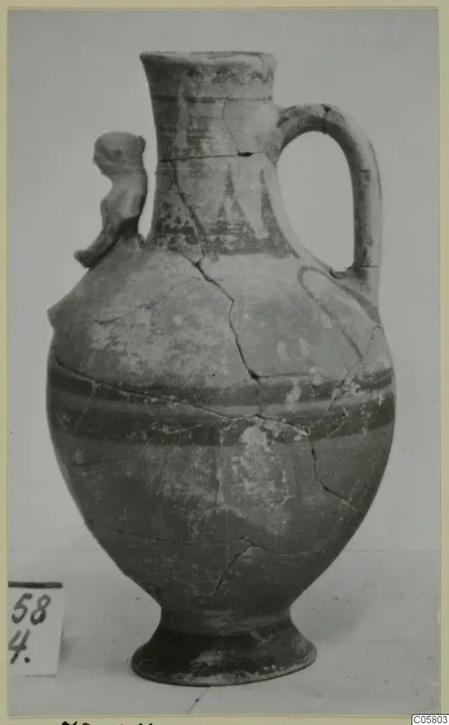 Bichrome-Red jug from Marion with a small modelled animal figure on the shoulder