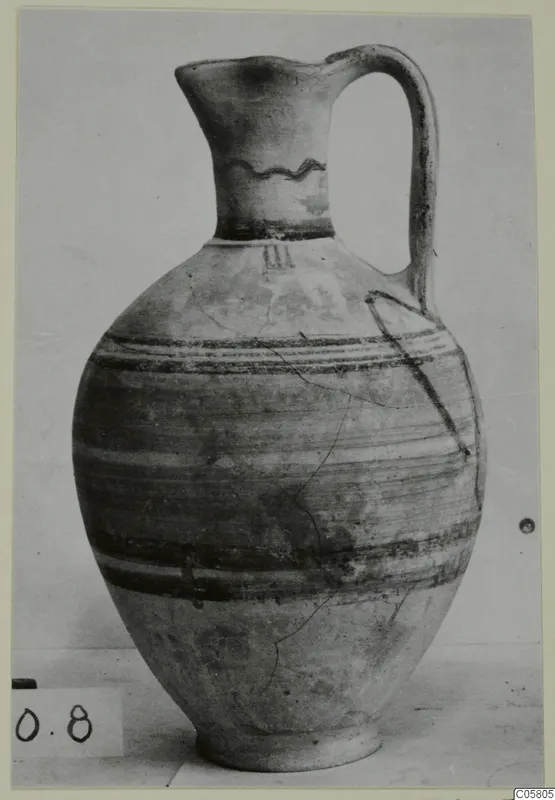 Jug with a single handle, painted bands and a wavy line on the neck, from Marion