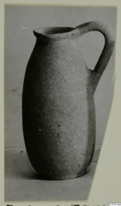 Plain pottery jug with a single strap handle, from Marion