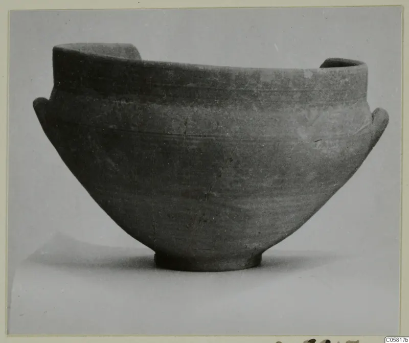 Red Slip bowl with two small side handles and a ring foot