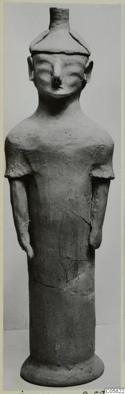 Terracotta statuette of a standing figure with arms at its sides, from Ayia Irini