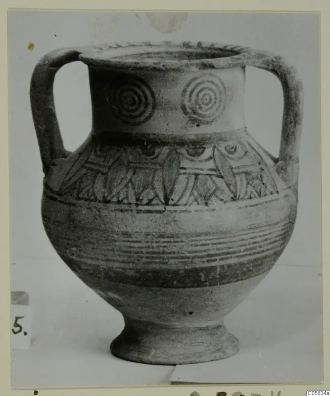 Pottery Bichrome IV amphora-crater with concentric circles on the neck and painted bands on the body