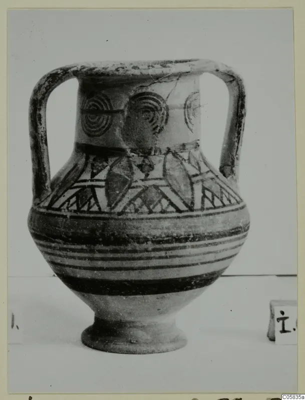Two-handled painted amphora-crater, Pottery Bichrome IV, with concentric circles on the neck and banded decoration on the body.