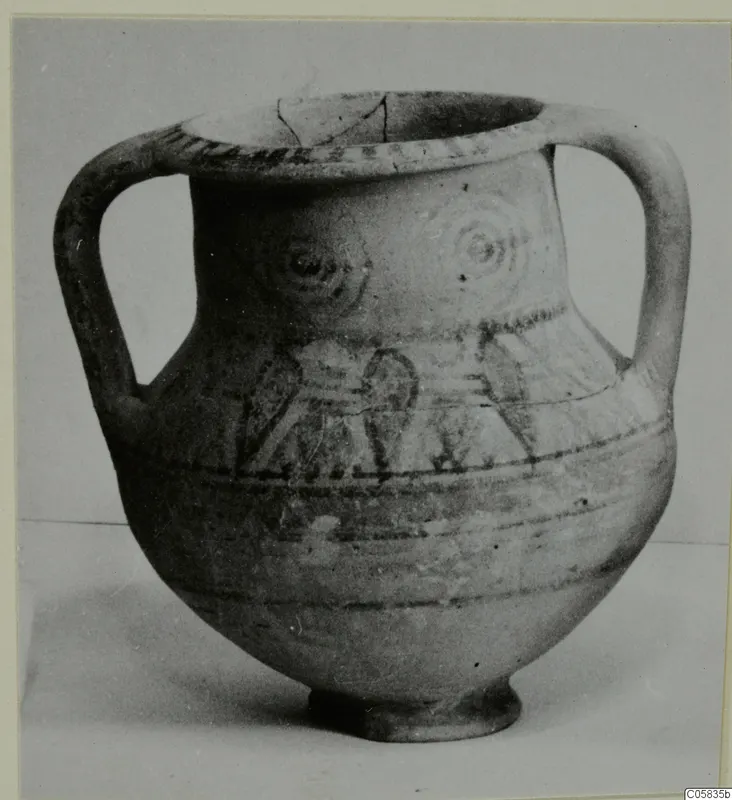 Pottery Bichrome V two-handled jar with painted bands and concentric circles on the shoulder