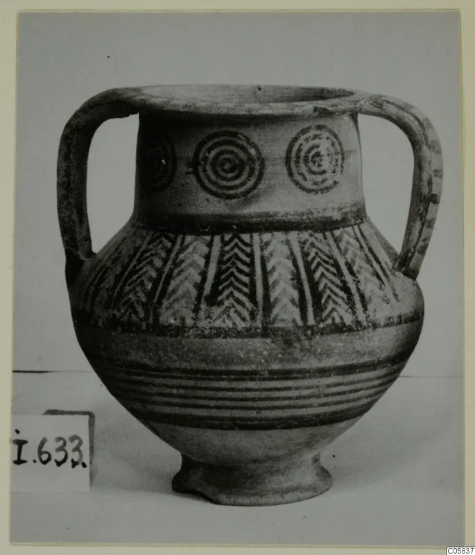 Two-handled Amphora-Crater vessel with concentric circles on the neck and painted bands and chevrons on the body