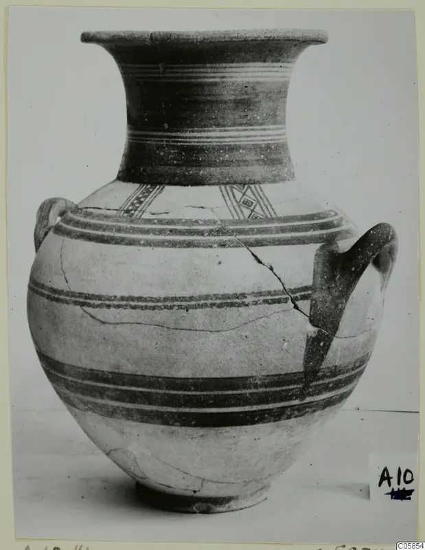 Pottery White Painted II jar with a flaring neck, two handles and dark painted bands, from Amathus