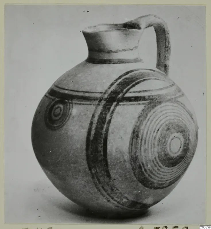 Jug from Amathus with a rounded body and dark concentric circles and bands painted on it