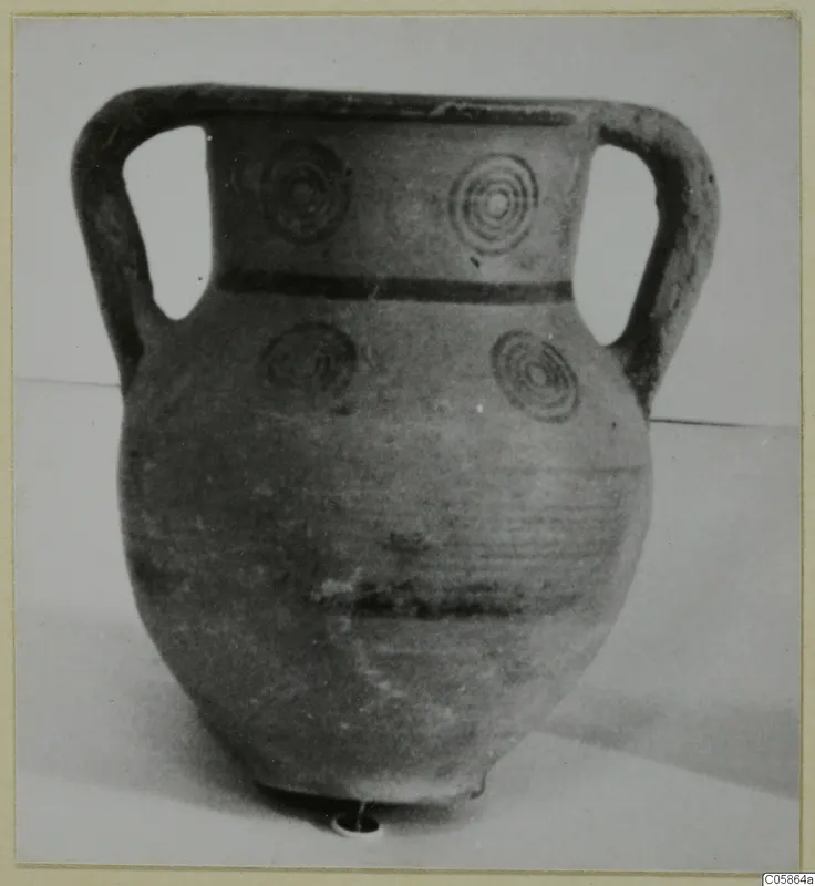 Pottery Black-on-Red II-IV amphoriskos with two handles and painted concentric circles