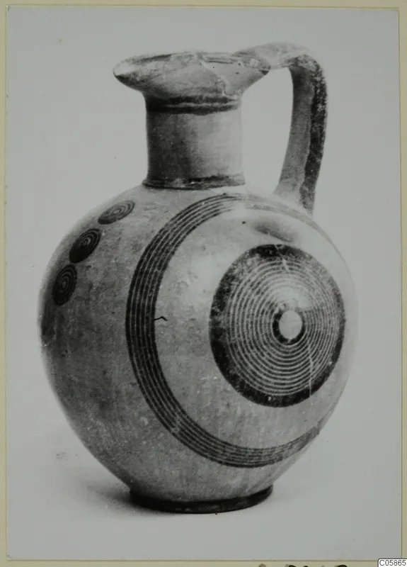 Pottery Black-on-Red II-IV juglet with concentric circle decoration on its body