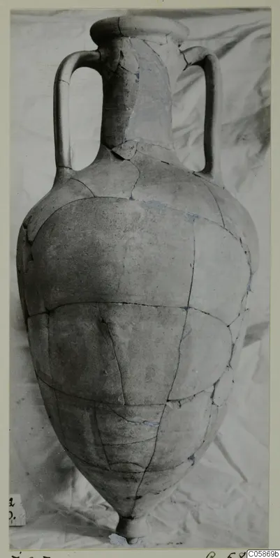 Large two-handled pottery vessel from Idalion, reassembled from fragments, photographed against a white cloth