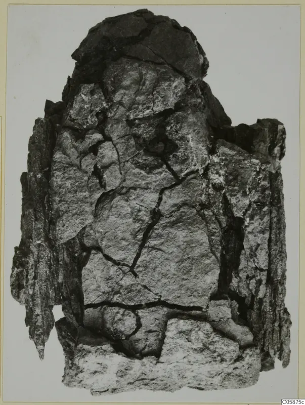Heavily corroded iron axe from Idalion, with flaking crust and deep cracks